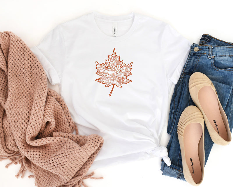 Fall Leaf Mandala Short Sleeve Tee: A Stylish and Versatile T-Shirt for People Who Love Fall and Mandalas