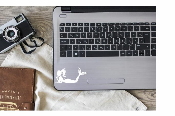 Relaxing Mermaid Vinyl Decal |White | Made in USA by Foxtail Decals | for Car Windows, Tablets, Laptops, Water Bottles, etc. |4.5 x 2.2 inch