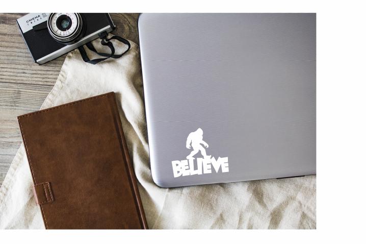 Sasquatch Believe Vinyl Decal | White | Made in USA by Foxtail Decals | for Car Windows, Tablets, Laptops, Water Bottles, etc. | 4.5 x 3.7 inch