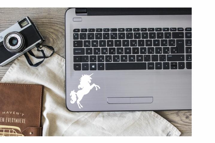 Unicorn Vinyl Decal |White | Made in USA by Foxtail Decals | for Car Windows, Tablets, Laptops, Water Bottles, etc. | 3.9 x 4.5 inch