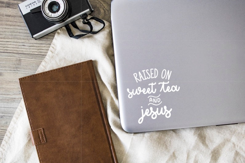 Raised On Sweet Tea and Jesus Vinyl Decal | White | Made in USA by Foxtail Decals | for Car Windows, Tablets, Laptops, Water Bottles, etc. | 4.4 x 4.5 inch