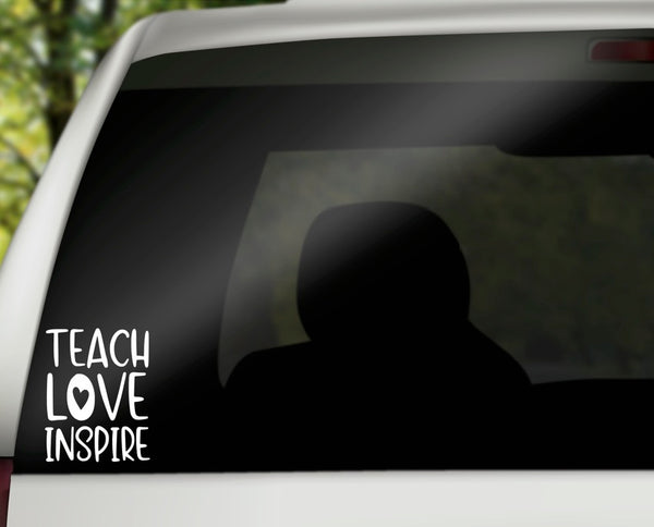 Teach Love Inspire Vinyl Decal | White | Made in USA by Foxtail Decals | for Car Windows, Tablets, Laptops, Water Bottles, etc. | 3.5 x 4.5 inch