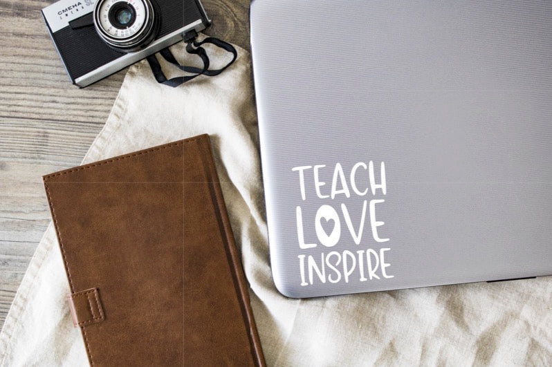 Teach Love Inspire Vinyl Decal | White | Made in USA by Foxtail Decals | for Car Windows, Tablets, Laptops, Water Bottles, etc. | 3.5 x 4.5 inch