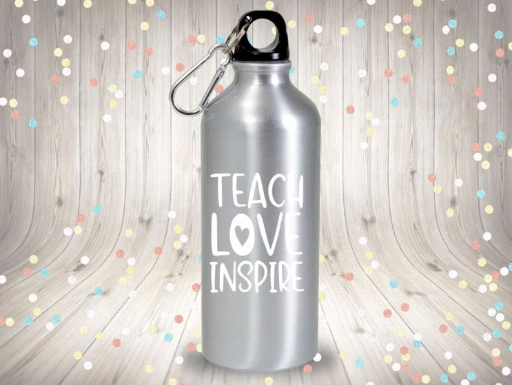 Teach Love Inspire Vinyl Decal | White | Made in USA by Foxtail Decals | for Car Windows, Tablets, Laptops, Water Bottles, etc. | 3.5 x 4.5 inch