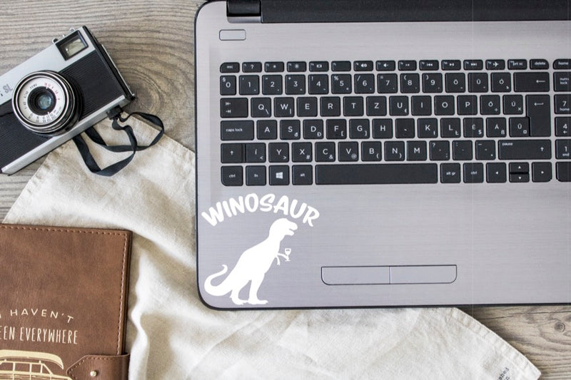 Winosaur Vinyl Decal | White | Made in USA by Foxtail Decals | for Car Windows, Tablets, Laptops, Water Bottles, etc. | 4.5 x 4.3 inch