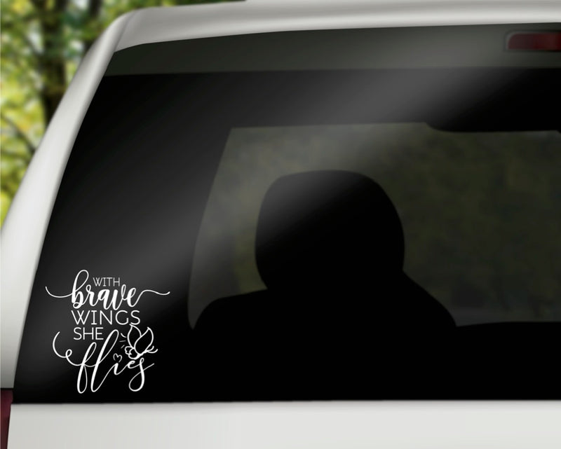 With Brave Wings She Flies Vinyl Decal | White | Made in USA by Foxtail Decals | for Car Windows, Tablets, Laptops, Water Bottles, etc. | 5.5 x 5.5 inch